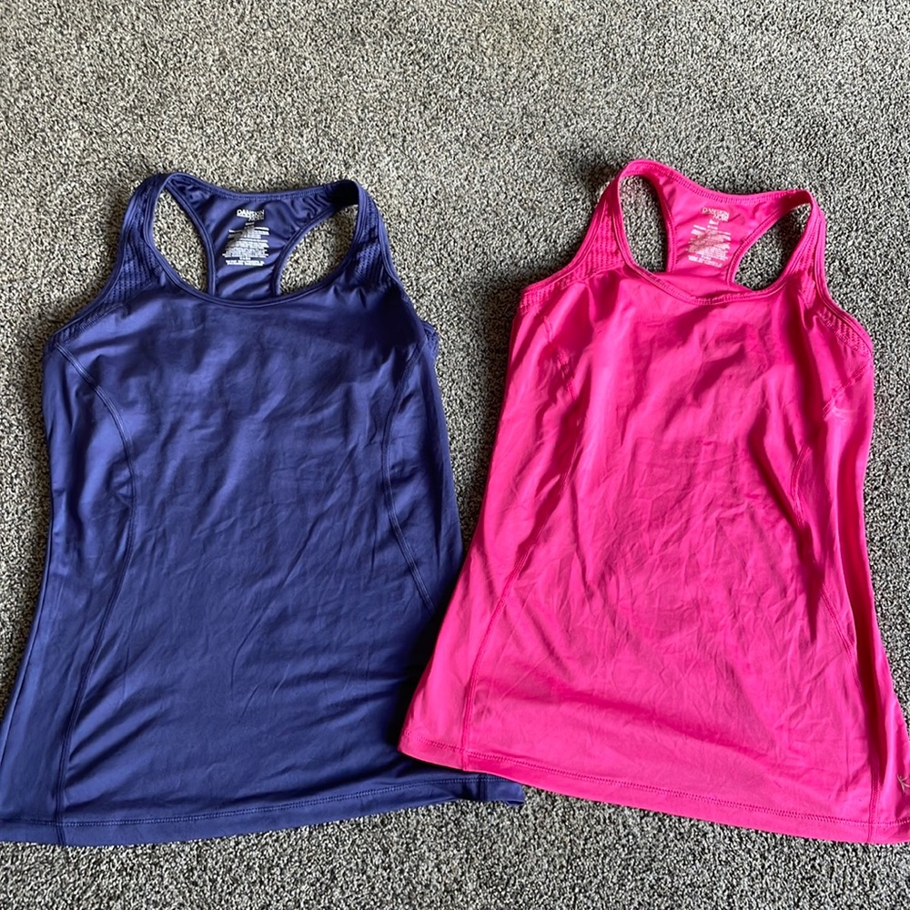 2 Danskin Now athletic tank tops. Colored Purple and Pink. Each worn once.